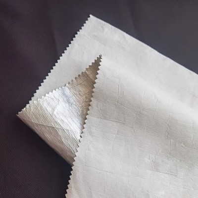 SZ-XR  特衛強  杜邦紙  超薄纸纹纸感防晒衣夹克布料  克重： 55（g/㎡）幅寬：145cm  成份：聚丙烯   細節-2